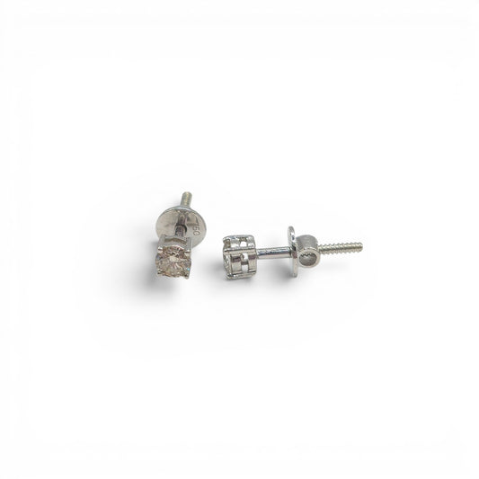18ct white gold diamond stud earrings by Reeves and Sons, featuring sparkling diamond gemstones on a sleek gold setting.