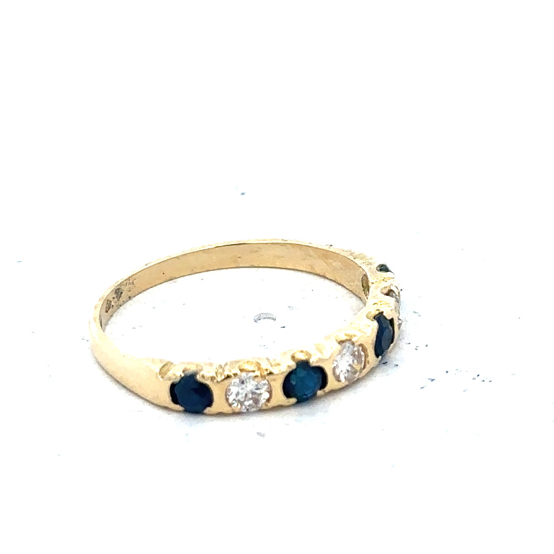 18ct yellow gold diamond and sapphire ring, size M 1/2, featuring sparkling gemstones and elegant craftsmanship.