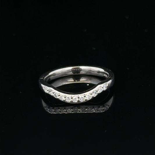 Platinum diamond wishbone ring by Reeves and Sons featuring a sparkling diamond design and elegant craftsmanship.