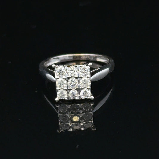 9ct white gold diamond ring with half-carat center stone, featuring a sleek band and sparkling design.