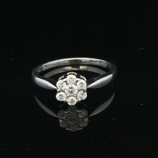 9ct white gold diamond cluster ring size O 1/2, featuring a sparkling diamond cluster design on a sleek band.