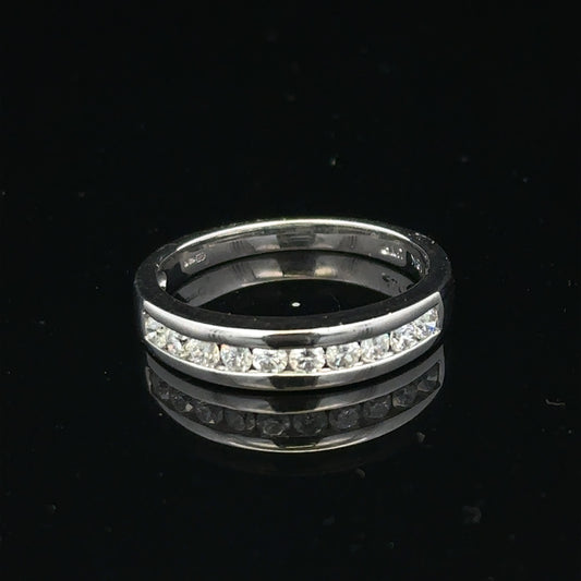 18ct white gold diamond ring in size L featuring sparkling diamonds, from Un, showcasing elegant jewelry design.