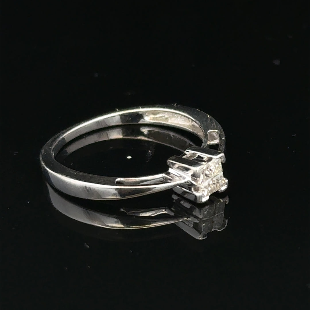 9ct white gold diamond ring with sparkling diamonds, showcasing a sleek and elegant design.