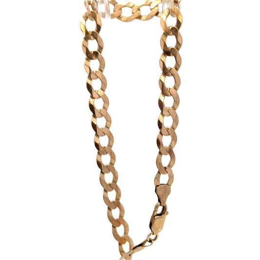 9ct yellow gold curb bracelet weighing 7.7g by Reeves and Sons, featuring polished interlinked chain design.