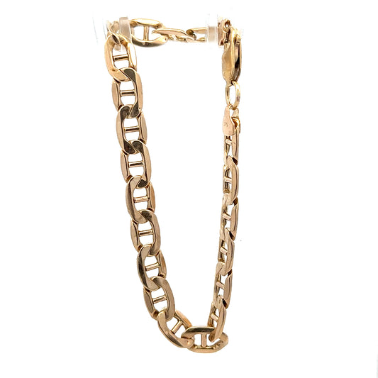 9ct yellow gold bracelet weighing 7.4g with a classic chain design, crafted by Reeves and Sons.