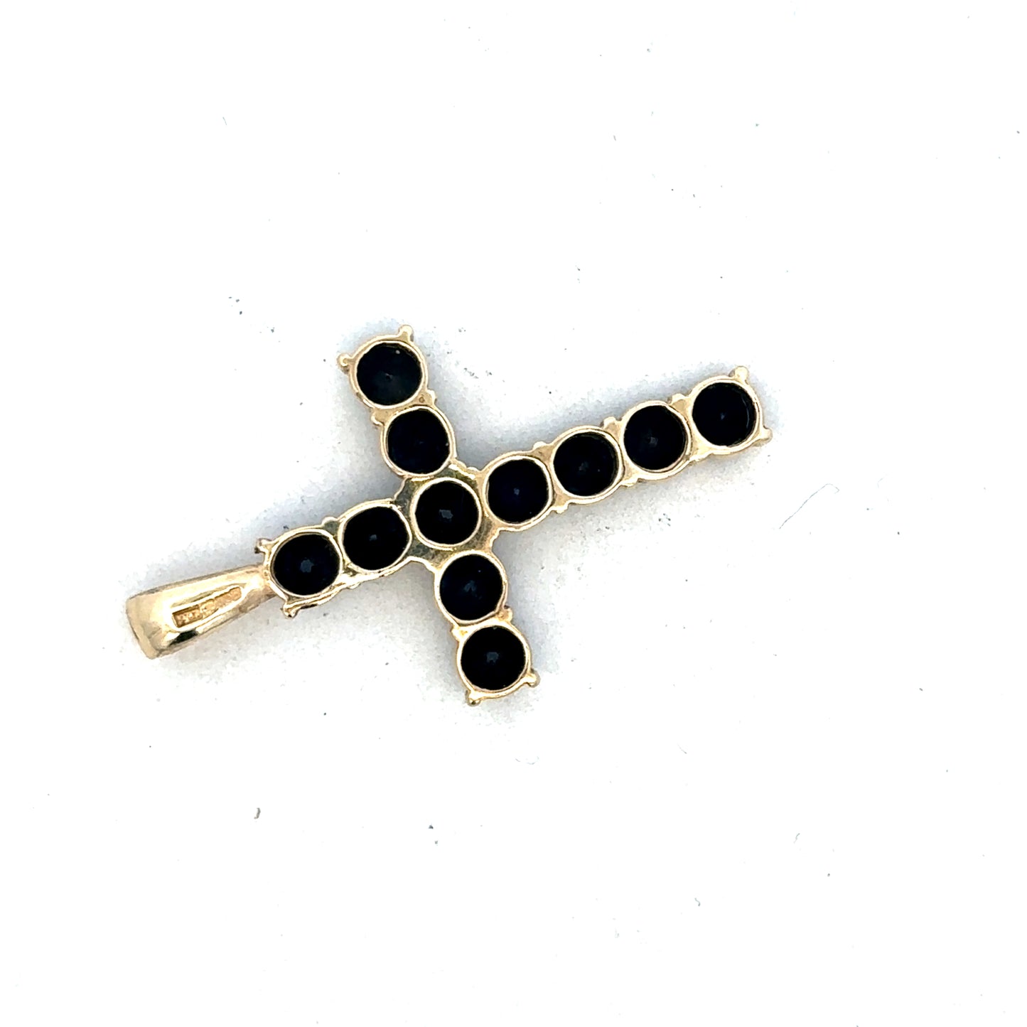 9ct yellow gold cross pendant by Reeves and Sons, featuring a detailed religious symbol design.