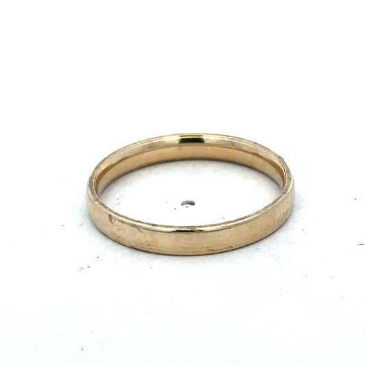 9ct yellow gold ring size T by Reeves and Sons, featuring a smooth polished band and classic design.