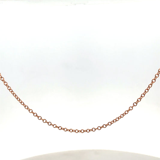 Reeves and Sons 9ct gold chain weighing 4.4g, featuring a delicate link design and polished finish.