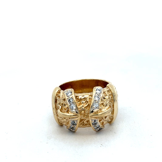 9ct yellow gold buckle ring in size Y, Reeves and Sons, showcasing a detailed design with a polished finish.