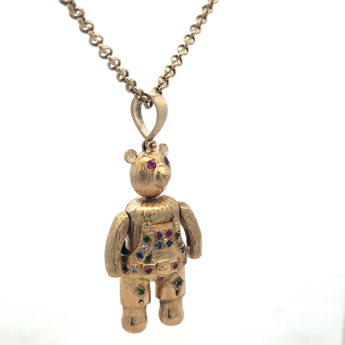 9ct yellow gold teddy bear pendant with detailed design, weighing 20.4g, from Reeves and Sons.