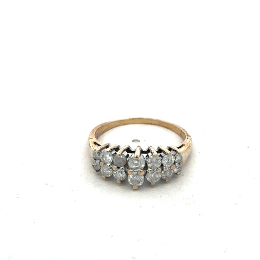 9ct yellow gold ring size N1/2 by Reeves and Sons, close-up view showing the polished band and detailed craftsmanship.