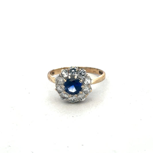 9ct yellow gold ring size N by Reeves and Sons, close-up showing smooth polished band and elegant design.