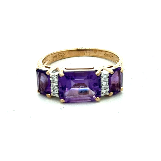 9ct yellow gold amethyst and diamond ring in size N with intricate band design, showcasing a vibrant purple gemstone and sparkling diamonds.