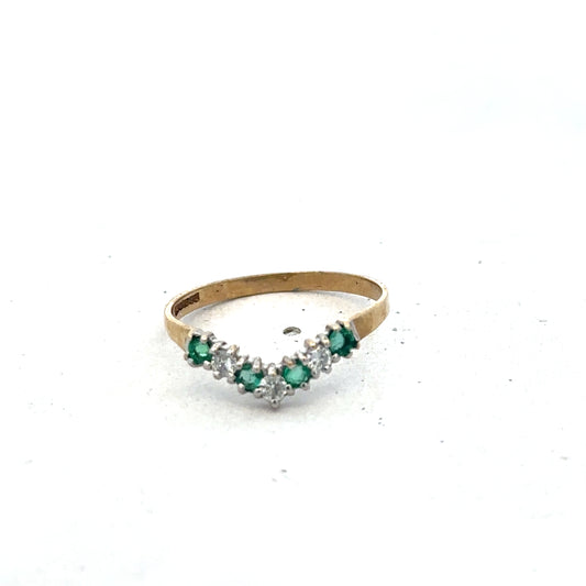 9ct yellow gold emerald and diamond ring with intricate band design, size O1/2, by Reeves and Sons.