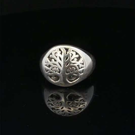 Silver ring size P by Reeves and Sons, featuring a smooth band design, displayed on a neutral background.