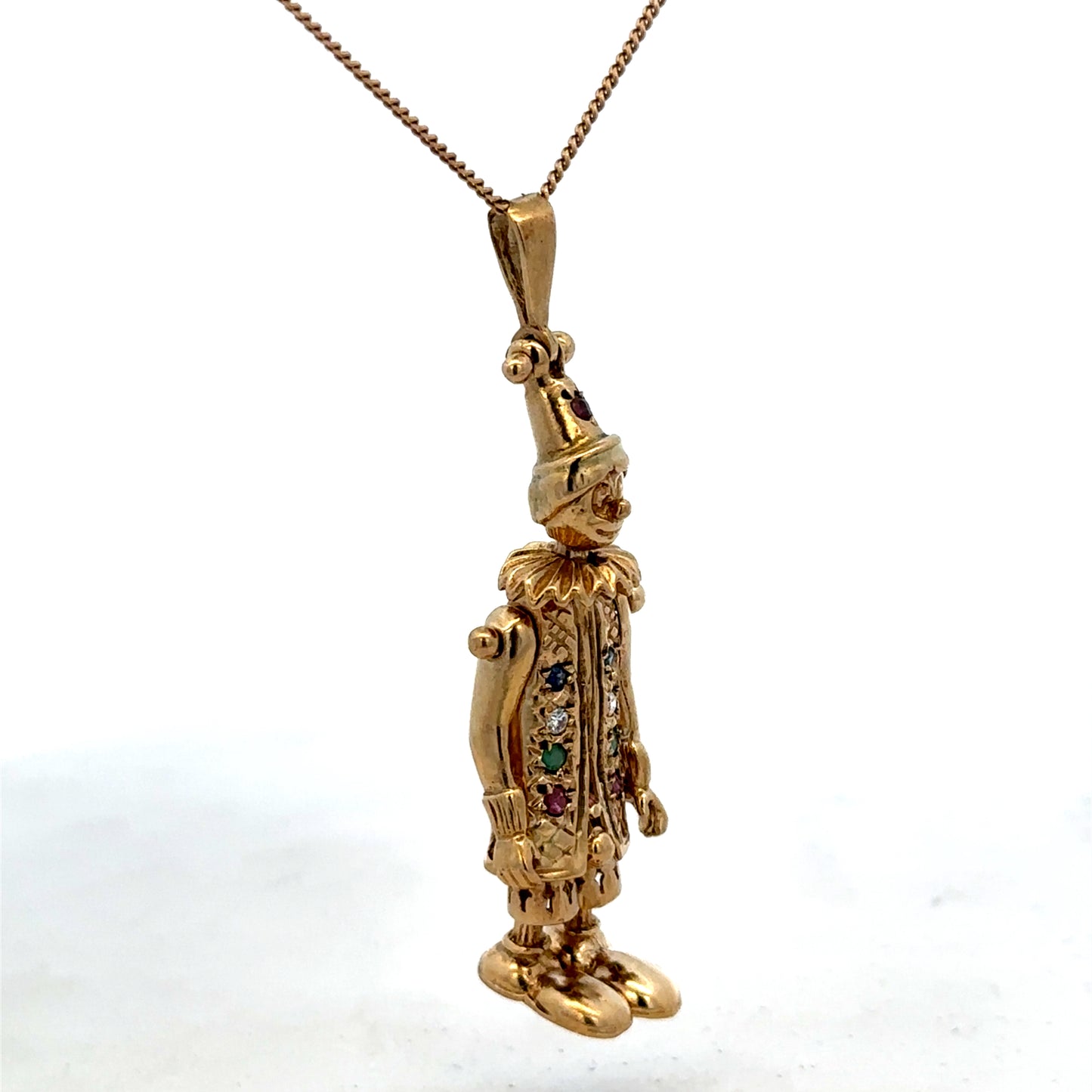 Gold clown pendant in 9ct yellow gold, weight 8.7g, featuring a detailed clown design from Reeves and Sons.