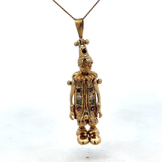 9ct yellow gold clown pendant weighing 8.7g, detailed jewelry piece from Reeves and Sons, featuring a playful clown design.