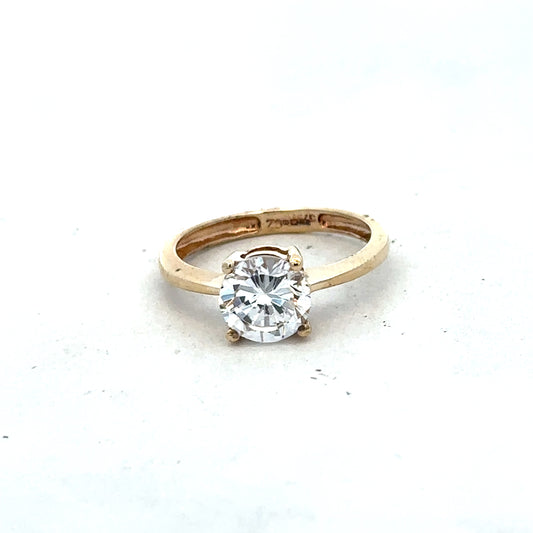 9ct yellow gold ring size P1/2 by Reeves and Sons, featuring a smooth polished band on a white background.