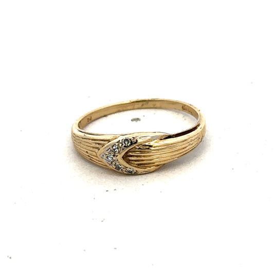 9ct yellow gold ring size P1/2 by Reeves and Sons, close-up showing polished band and classic design.