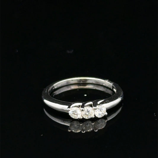 18ct white gold diamond ring by Reeves and Sons with sparkling diamonds and elegant design.