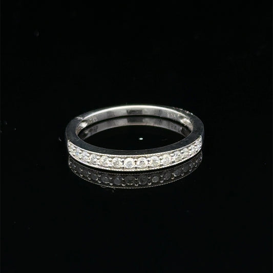 9ct white gold half eternity diamond ring with sparkling diamonds, showcasing Reeves and Sons craftsmanship on a white background.