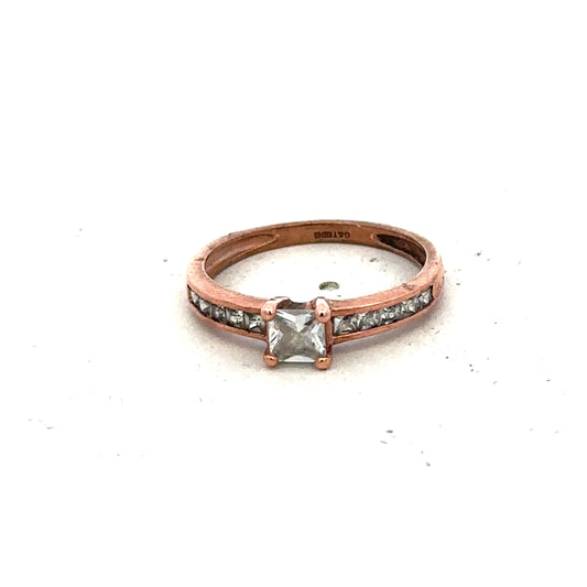 9ct rose gold ring size K by Reeves and Sons, featuring a smooth polished band.