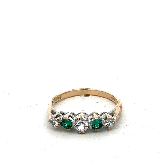9ct yellow gold ring size N from Reeves and Sons, close-up showing smooth, polished band with subtle shine.