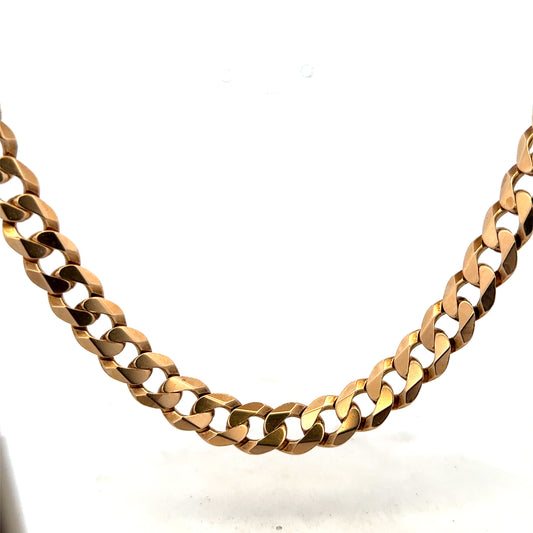 9ct yellow gold curb chain, Reeves and Sons, showing its smooth links and polished finish.