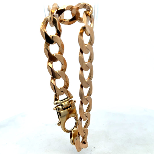 9ct yellow gold curb bracelet with a polished finish, weight 48g, handcrafted by Reeves and Sons.