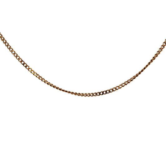 9ct yellow gold chain weighing 7.3g, showcasing a delicate Reeves and Sons jewelry design with intricate links.