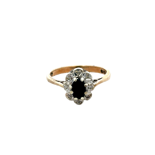 9ct yellow gold sapphire and diamond ring, size N, featuring a central sapphire gemstone and diamond accents, by Reeves and Sons.