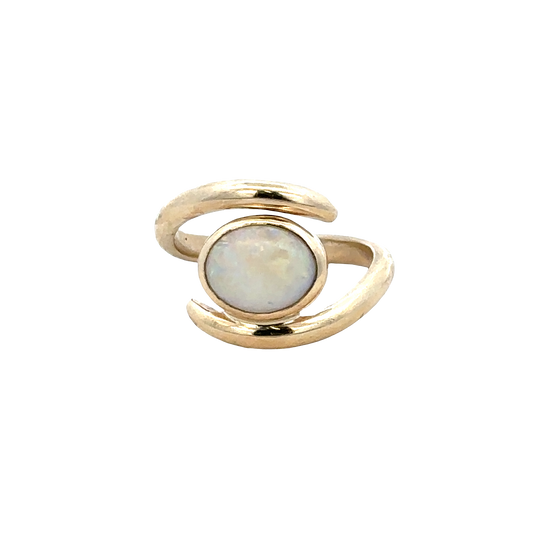 9ct yellow gold opal ring by Reeves and Sons featuring a vibrant, oval-cut opal gemstone on a polished gold band