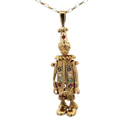 9ct yellow gold clown pendant weighing 8.6g, Reeves and Sons jewelry, detailed clown design with bright gold finish.
