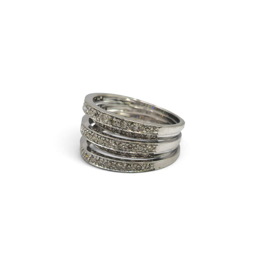 9ct white gold five-row diamond ring by Reeves and Sons, featuring sparkling diamonds and intricate band design.