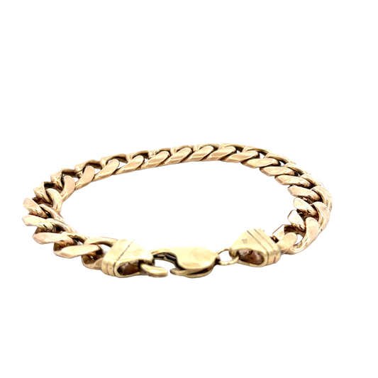9ct yellow gold curb bracelet weighing 42.4g, featuring a classic chain design from Reeves and Sons.