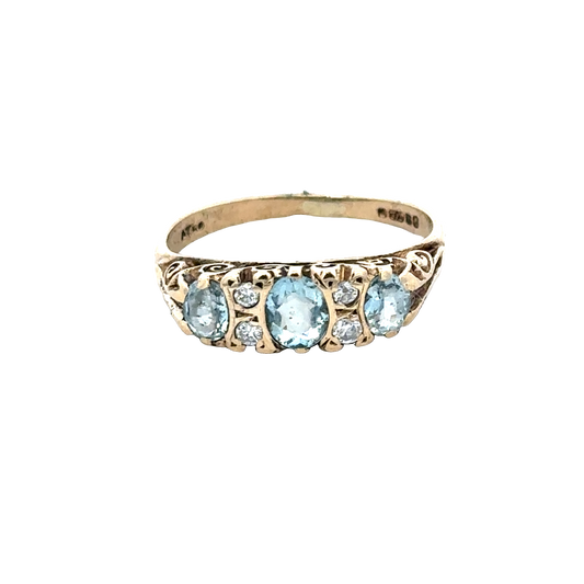 9ct yellow gold ring size J by Reeves and Sons, close-up showing detailed craftsmanship and polished finish.