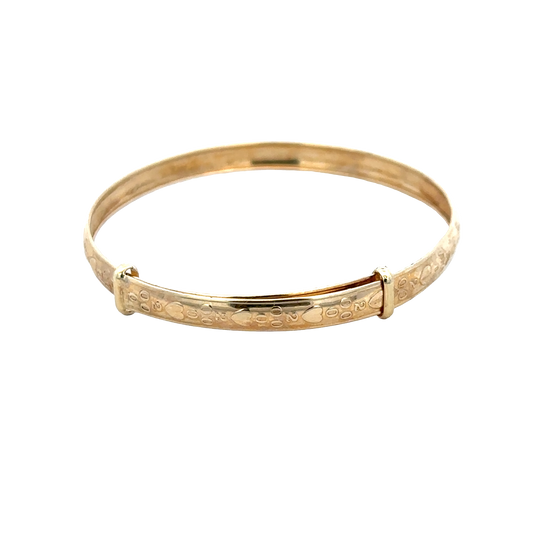 9ct yellow gold baby bangle weighing 2g, designed by Reeves and Sons, featuring a smooth, polished finish.