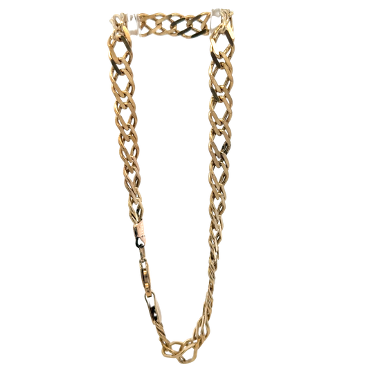 Double linked 9ct yellow gold bracelet by Reeves and Sons, showcasing polished links and elegant design.