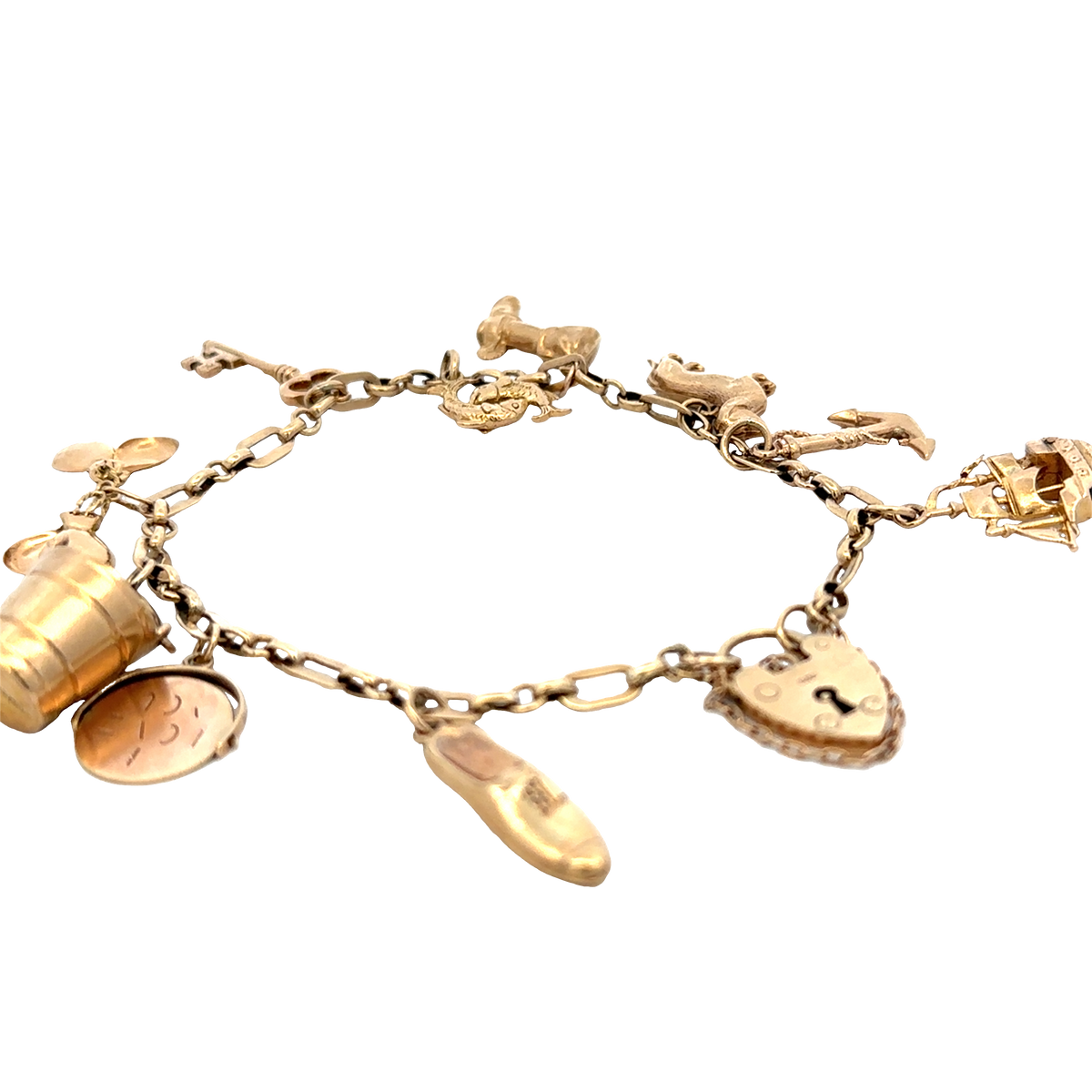 9ct yellow gold charm bracelet by Reeves and Sons, 16.3g, displayed on a plain background