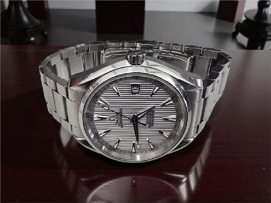 Omega Seamaster Aqua Terra Co-Axial watch with full set, showing stainless steel case, blue dial, and bracelet.