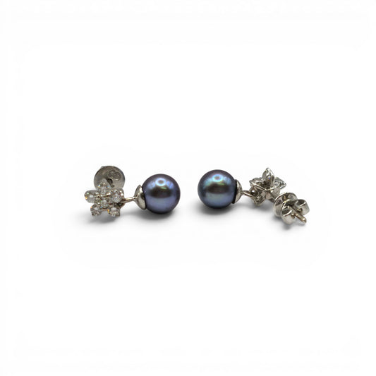 18ct white gold diamond and pearl earrings by Reeves and Sons, featuring elegant pearls and sparkling diamonds.