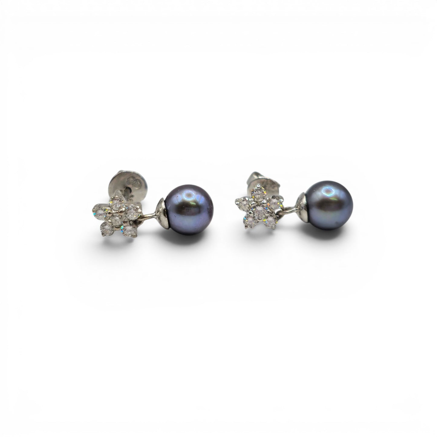 18ct white gold diamond and pearl earrings by Reeves and Sons, showcasing elegant design with sparkling diamonds and lustrous pearls