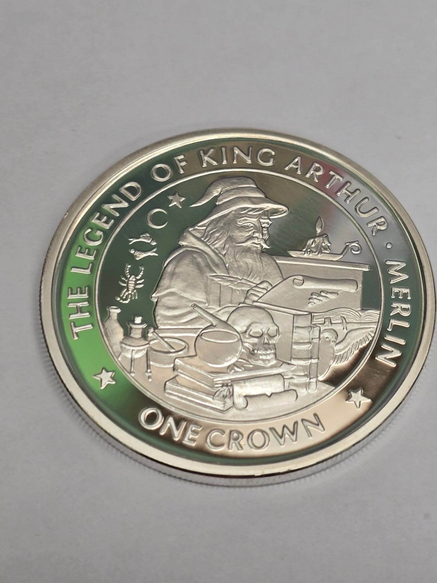Silver King Arthur coin featuring a crown design, from Reeves and Sons, showcasing intricate details of the legendary monarch.