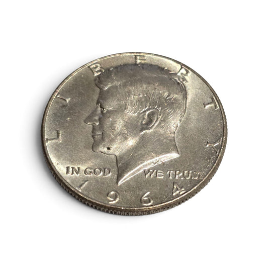 1964 US Kennedy Half Dollar coin in proof-like finish, made of .900 silver, featuring Kennedy's portrait and detailed inscriptions.