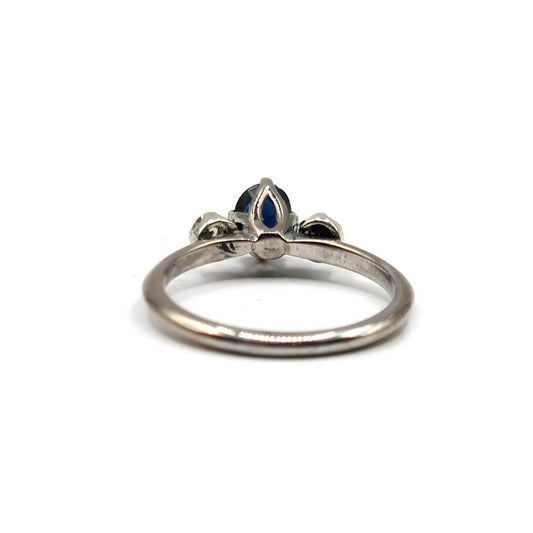 18ct white gold sapphire ring with 0.70 carat central sapphire and 0.30 carat accent sapphires, elegant jewelry piece.