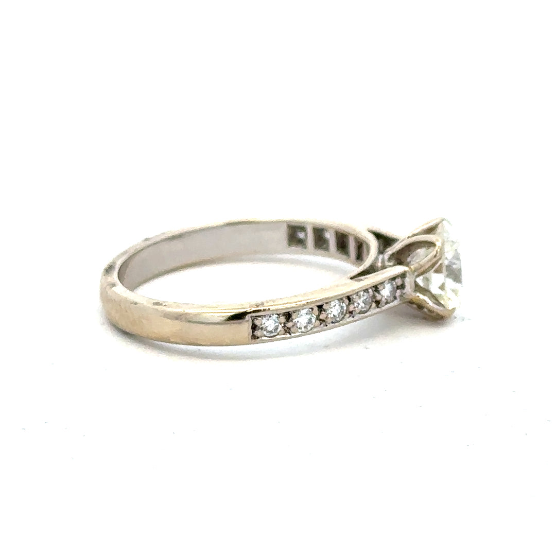 18ct white gold diamond ring with 1.135 carats, Colour I, Clarity SI1, featuring a sparkling central diamond.