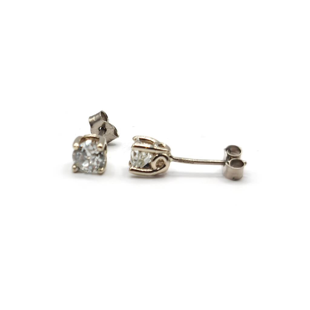 18ct white gold diamond earrings featuring 1.17 carats of sparkling diamonds, elegant and timeless jewelry piece.