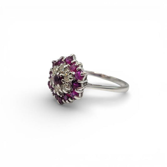 18ct white gold diamond and ruby ring with sparkling gemstones, featuring a classic design and elegant craftsmanship.