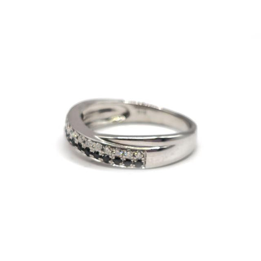 18ct white gold diamond ring with a central sparkling diamond and elegant band, showcasing fine craftsmanship and luxury design.
