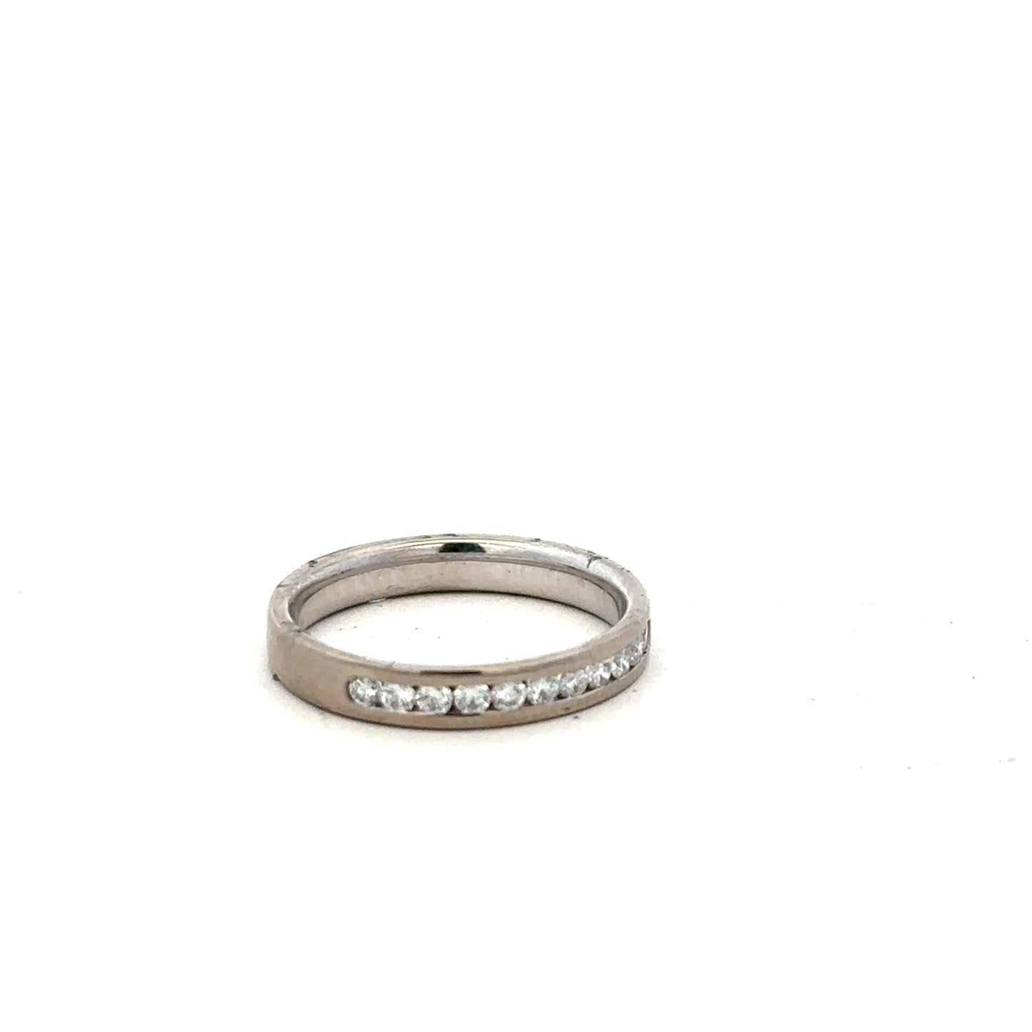 18ct white gold diamond ring in size J 1/2 with sparkling diamonds, showcasing elegant jewelry craftsmanship.